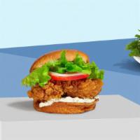 Classic Cluck Sandwich  · Crispy fried chicken, special house slaw, and mayo. Served on a bun.