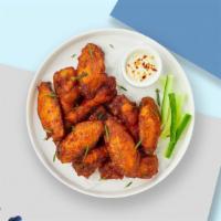 Classic Wings  · Fresh chicken wings breaded and fried until golden brown. Served with a side of ranch or ble...