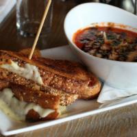 Grilled Cheese & Tomato Soup · melted brie & Gruyère, tomato jam, caramelized onions