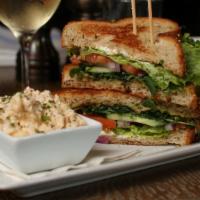 Garden Veggie Sandwich · goat cheese spread, ripe avocado, tomato & cucumber, fresh sprouts, multi-grain toast, potat...