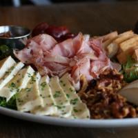 Charcuterie & Brie · shaved prosciutto, double cream brie, ripe pears, olives, toasted walnuts