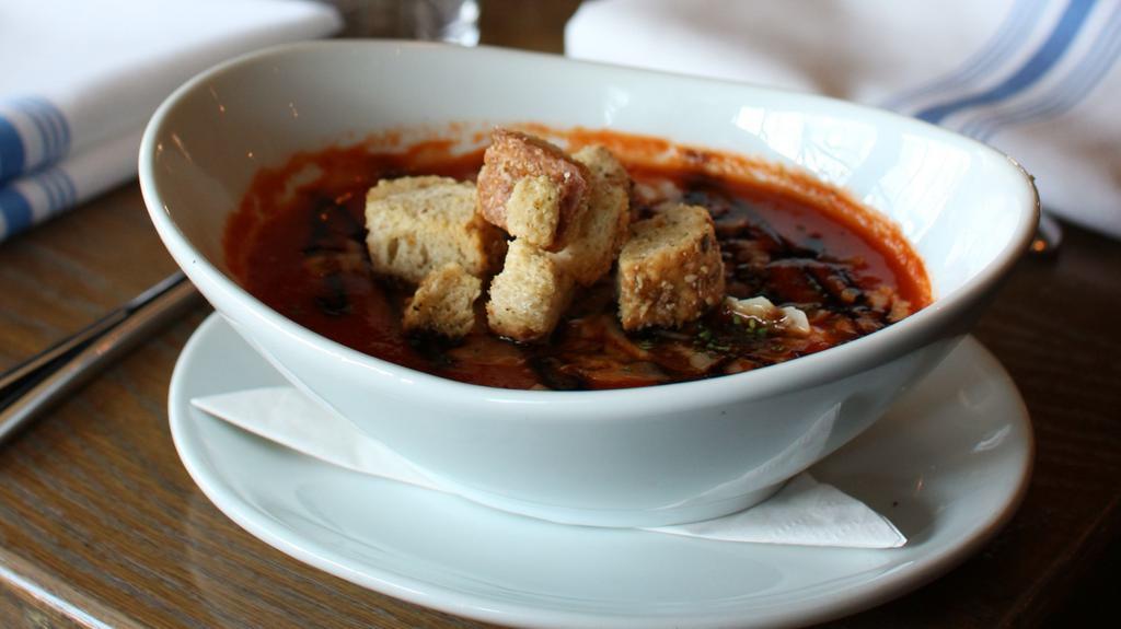 Roasted Tomato Soup · rustic croutons, shaved Parmesan, balsamic reduction