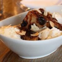 Croissant Bread Pudding · roasted cherries, toasted coconut, freshly whipped cream