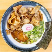 Niku Soba Ramen · Hakata- style niko soba ramen in tonkotso broth,  fish cake, topped with green onion, roaste...