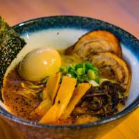 Spicy Miso Ramen · Ramen noodle with spicy miso topped with char siu, egg, green onion, sesame seeds.