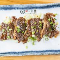 4 Pieces Short Ribs · Fried Japanese style, marinated with sesame seeds.