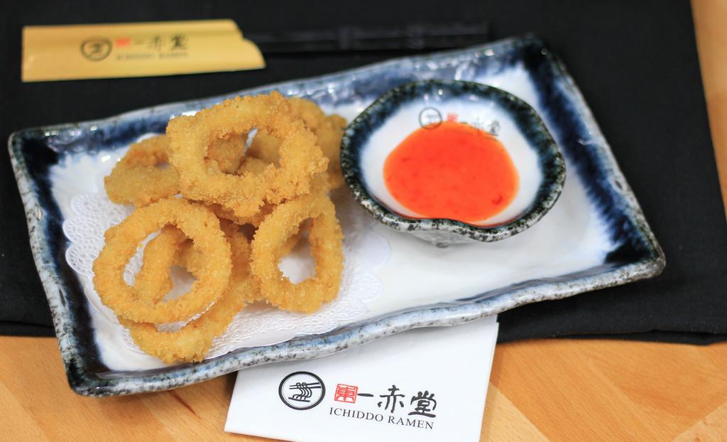 Calamari · Deep fried ring squid with sweet spicy sauce.