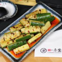 Salted Cucumber · Sliced out cucumber with spciy sauce shichimi togarashi and sesame oil.
