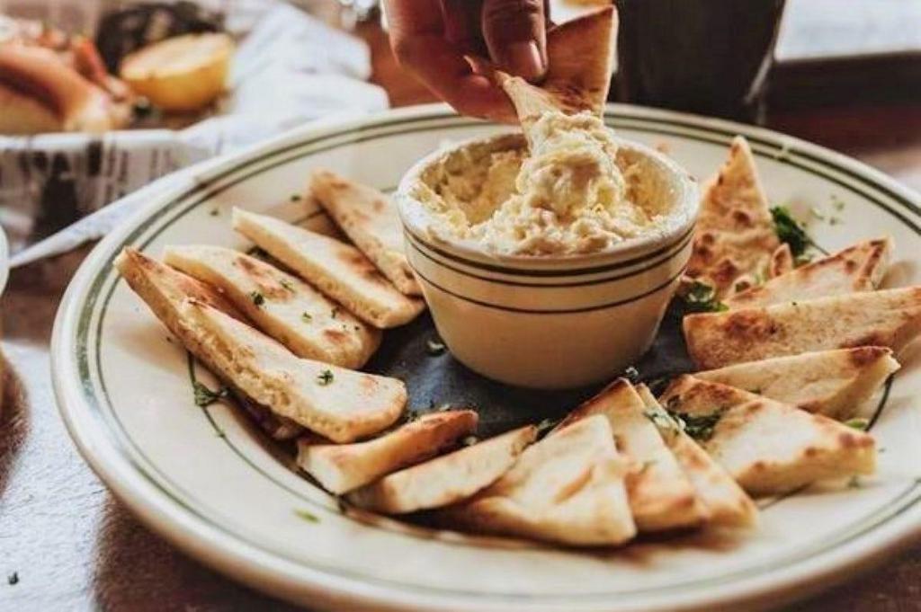 Artichoke Dip · Artichoke Hearts, Cream Cheese, Parmesan, and Pita Bread