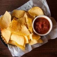 Tortilla Chips · With Housemade Salsa, Creamy Queso, or both!