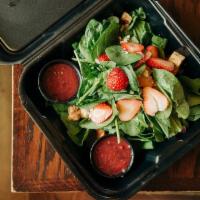 Spinach Salad · Spinach, Strawberries, Croutons, Red Onion, Bleu Cheese Crumbles, Raspberry Vinaigrette