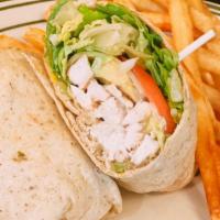 Monterey Wrap · Grilled Chicken Breast, Lettuce, Tomato, Avocado, Big Eye Swiss, Red Onions, and Ranch, in a...