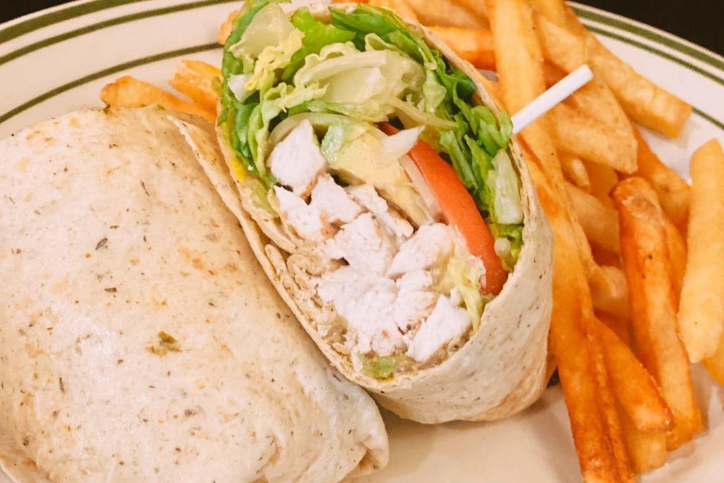 Monterey Wrap · Grilled Chicken Breast, Lettuce, Tomato, Avocado, Big Eye Swiss, Red Onions, and Ranch, in a Garlic Herb Tortilla