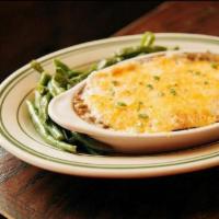 Cottage Pie · Beef Tips, Green Peas, Covered with Mashed Potatoes and Shredded Cheddar Jack, with Seasonal...