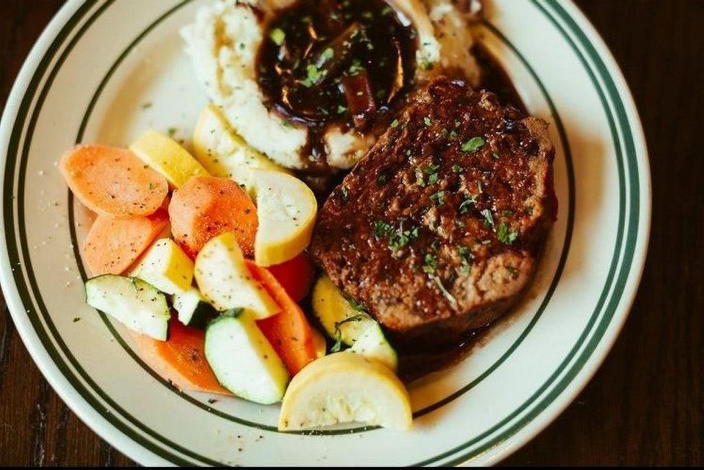 Cajun Meatloaf · Our Classic Cajun-Style Meatloaf topped Mushroom Gravy, served with Mashed Potatoes and Seasonal Vegetables