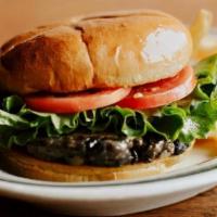 Black Bean Burger · Our Black Bean Patty served with Lettuce and Tomato on a Brioche Bun with your choice of side