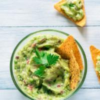 Chips & Guacamole · Delicious, corn tortilla chips, served with a homemade guacamole.