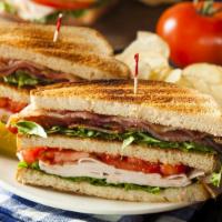 Grilled Turkey Club Sandwich · Mouthwatering House special sandwich prepared with Oven roasted turkey, bacon, melted chedda...
