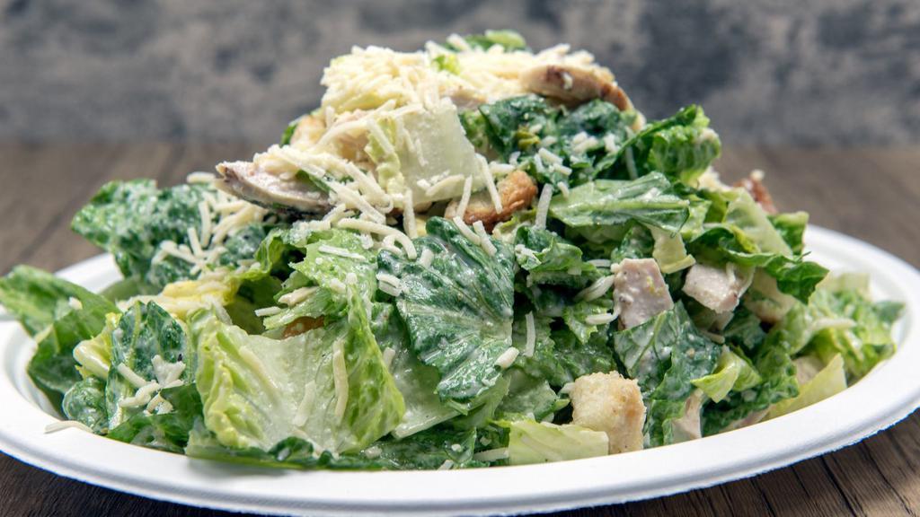 Loaded Caesar Salad · Fresh & Delicious salad prepared with Romaine lettuce, bacon bits, diced hard-boiled egg, Parmesan cheese, and garlic croutons tossed in a creamy Caesar dressing.