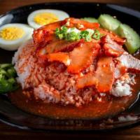Kow Moo Dang (Roasted Bbq Pork) · Roasted pork with Thai BBQ gravy sauce, prepared with boiled eggs, green onions, and cucumbe...