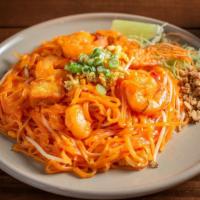 Pad Thai · hin rice noodle cooked with bean sprouts, eggs, green onions, ground peanuts, lime, and tama...