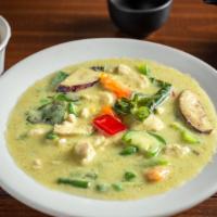 Spicy Green Curry · Spicy. Green curry paste blended with spices and coconut milk. Cooked with basil leaves, egg...
