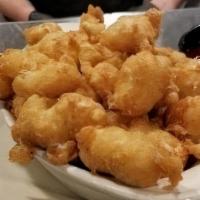 Cheese Curds · Fresh Ellsworth white cheddar cheese curds, new glarus spotted cow beer batter, blackberry k...