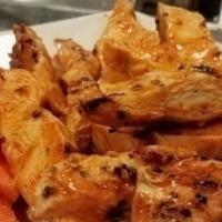 Skinny Wings · Twin char-grilled all natural chicken breast, carrot stick, ranch or bleu cheese.