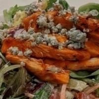 Buffalo Salad · Local revol spring greens, pico De gallo, bleu cheese crumbles, banana peppers, carrots, red...