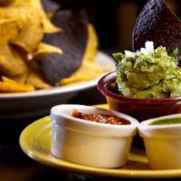 Guacamole · Chips with red and green salsas made fresh daily.
