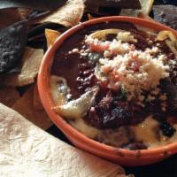 Chorizo Fundido · Rich, flavorful and bold. Warm bean dip with jack cheese, caramelized onion, chorizo sausage...