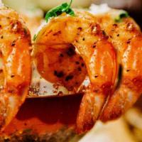 Fiery Shrimp · 8 Hot jumbo gulf shrimp with sizzling chipotle oil, warm tortillas, grilled ciabatta bread a...