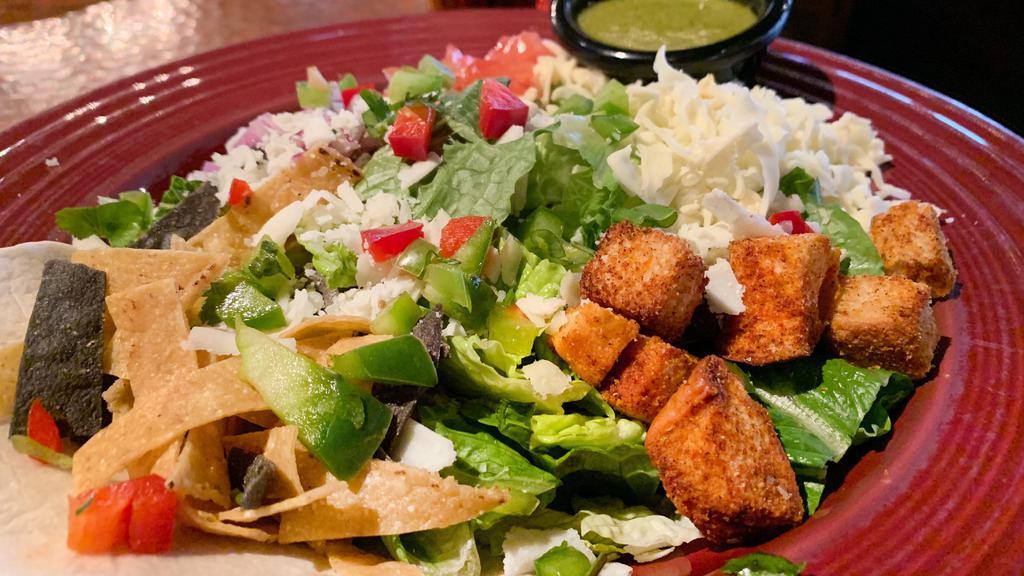 Koko’S Harvest Salad · Grilled chicken with sweet pepper dressing, jack cheese, bacon, tomato, avocado, red onion, croutons and jalapeño ranch.