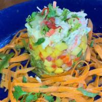 Crab Stacked Salad · Romaine lettuce, jumbo lump crab, mango and guacamole stacked with sweet and spicy vinaigret...