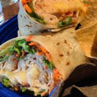 New Mexico Club · Smoked turkey, jack cheese, lettuce, carrots, bacon and sun-dried tomato mayo wrapped in a f...