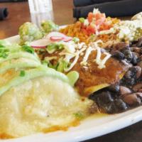 Johhny’S Big Plate · Poblano chile filled with pork carnitas, a sharon's enchilada, a steak and mushroom enchilad...