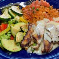 Wood-Grilled Chicken Breast - Dinner Portion · seasonal veggies, rice, adobo chile, barbecue or garlic cream sauce.