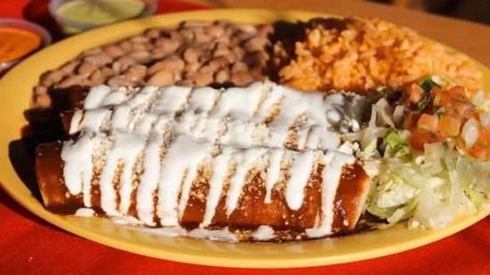 Enchiladas Rojas · Three corn tortillas stuffed with choice of meat, smothered in our house red salsa, queso fresco, sour cream, pico de gallo, with a side of homemade pinto beans and rice.