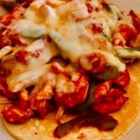 Alambres · Choice of meat, sautéed fajitas peppers and onions, melted monetery jack cheese. Served with...