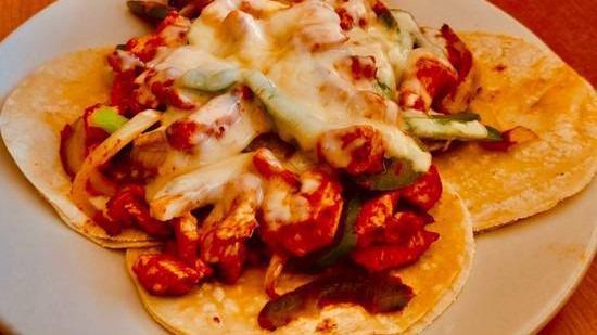 Alambres · Choice of meat, sautéed fajitas peppers and onions, melted monetery jack cheese. Served with corn tortillas.