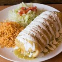 Chimichangas · Homemade rice, beans, meat, rolled up and deep fried cover with our house made salsa and mel...