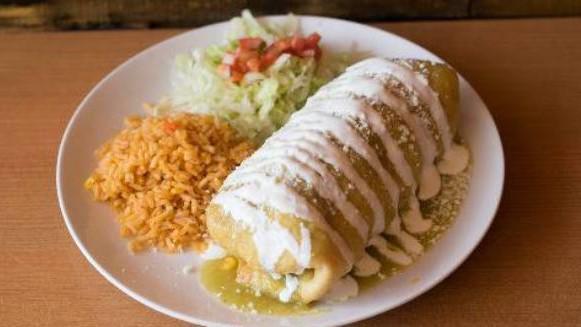 Chimichangas · Homemade rice, beans, meat, rolled up and deep fried cover with our house made salsa and melted cheese, sour cream , guacamole,  and pico de Gallo