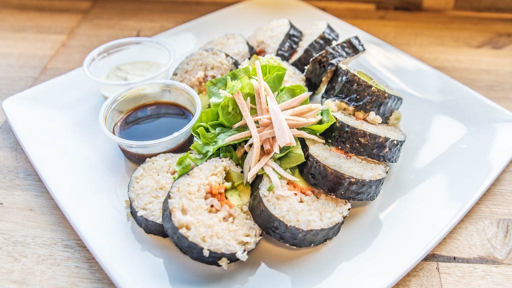 Nori Roll · Organic rice, daikon, carrot, pickle, avocado in a toasted nori roll, with house made pickled organic ginger and wasabi mayo and ponzu sauce for dipping.