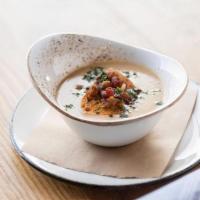 Ale & Cheddar Soup · Topped w/ Sourdough Crostini & Pork Croutons