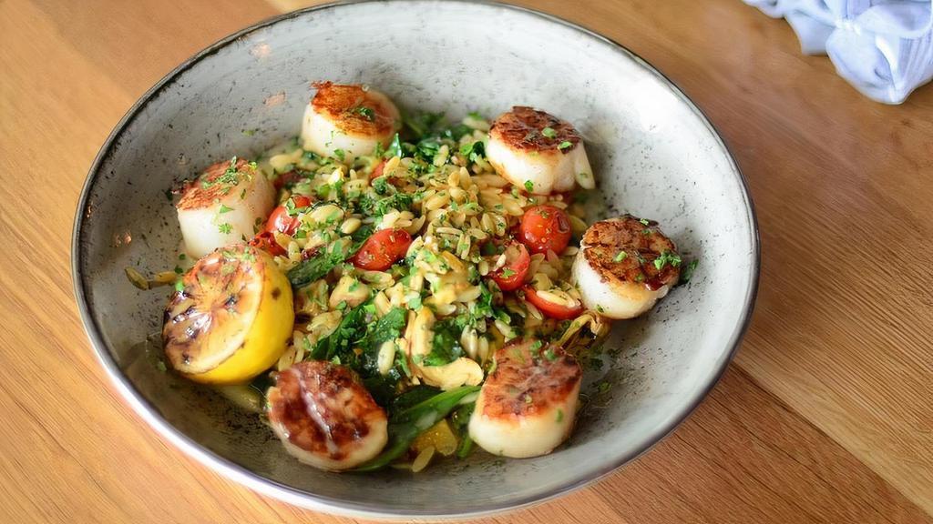 Sea Scallop Scampi · Orzo Pasta, Blistered Tomatoes, Spinach, Roasted Artichokes, Shallots, Garlic & Scampi Butter Sauce
