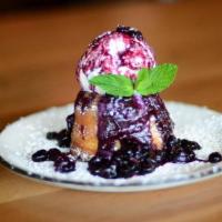 Warm Blueberry Butter Cake · Blueberry Sauce, Whipped Cream & Mint (V)