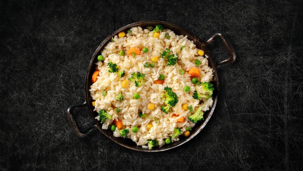 Vegetable Fried Rice (Vegan) · Long grain aromatic rice wok tossed with fresh seasoned vegetables and Indo-Chinese sauces.