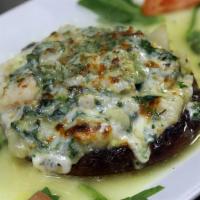 Seafood Portabella For Two · Portabella mushroom topped with shrimp, scallops, spinach, lemon wine sauce and baked with P...