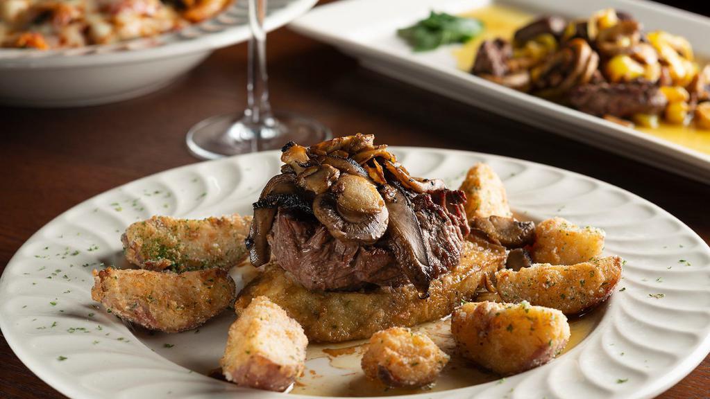 Filet Mignon 8 Oz. · Gluten-free. USDA choice 8 oz. cut of filet mignon char-grilled to your taste with mushrooms. Served with zip sauce.
