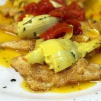 Perch Diane · Sautéed yellow lake perch topped with artichoke hearts, diced tomatoes, and lemon wine sauce.